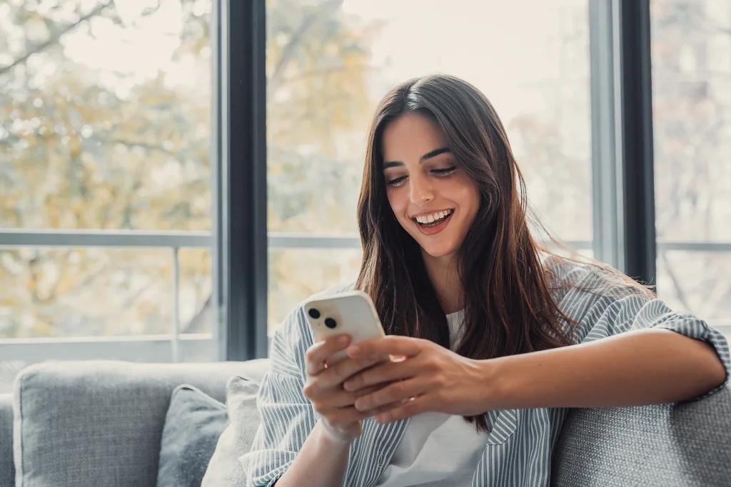 woman on her phone taking a break from work