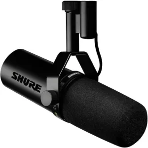Shure SM7B vocal dynamic microphone with black foam cover on studio mount.