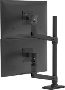 Vertical dual monitor arm setup mounting two computer screens stacked one above the other on a single heavy-duty black desk stand.