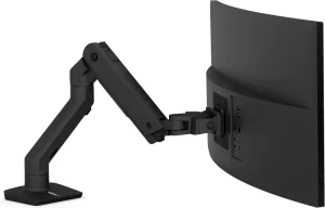Premium black articulated monitor arm holding a large curved computer screen, attached via a low-profile desk mount base.