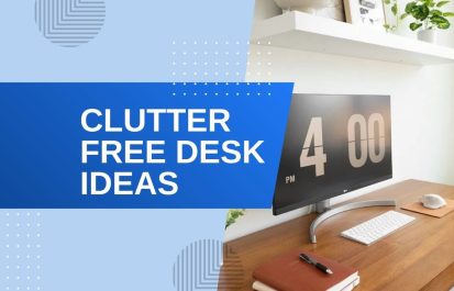 A clean, minimalist wooden desk with a large computer monitor displaying a digital clock, a wireless keyboard, and a notebook, featuring a blue graphic overlay with the text 'CLUTTER FREE DESK IDEAS'.