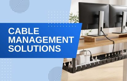 A tidy home office desk setup featuring dual monitors and an under-desk cable management tray organizing power bricks and cords for a clean workspace.
