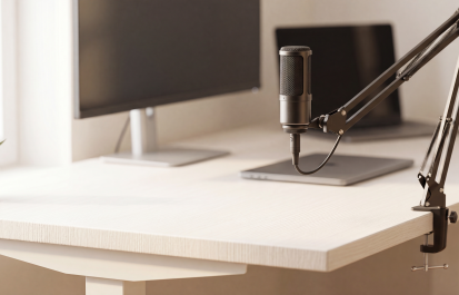 How to reduce background noise on video calls — clean home office desk setup with professional USB microphone on boom arm